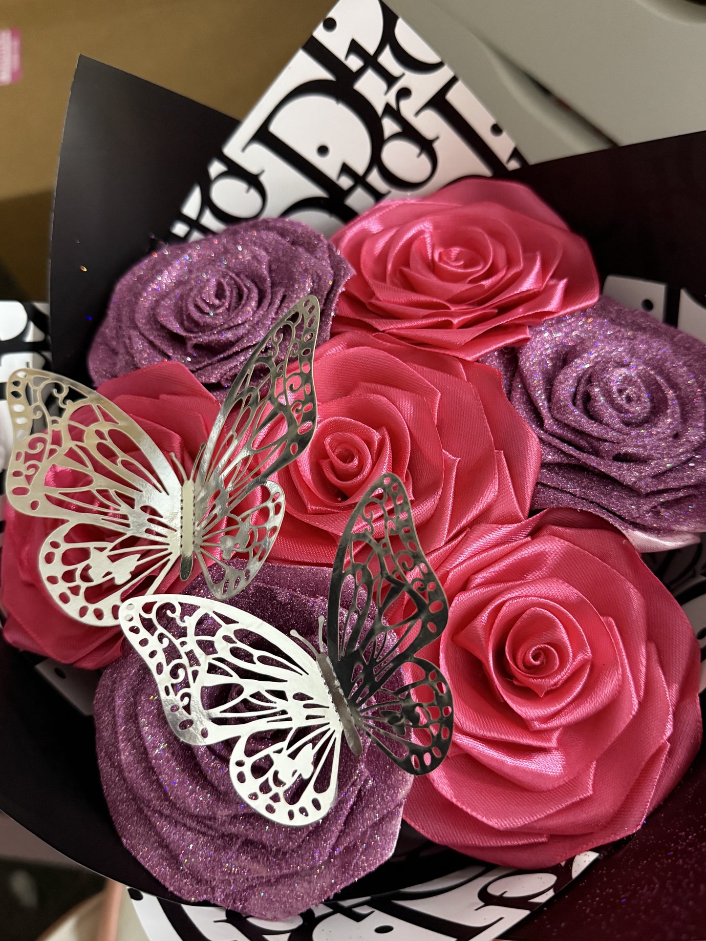 pink glitter roses with dior paper and butterflies